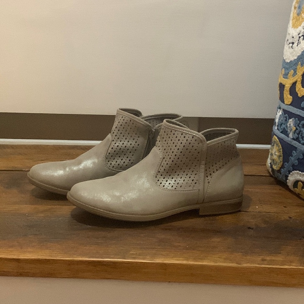 silver booties with a zipper